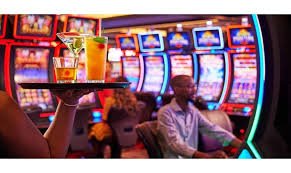 maju123 Big Time Gaming slot lobby showing multiple game titles and player balance